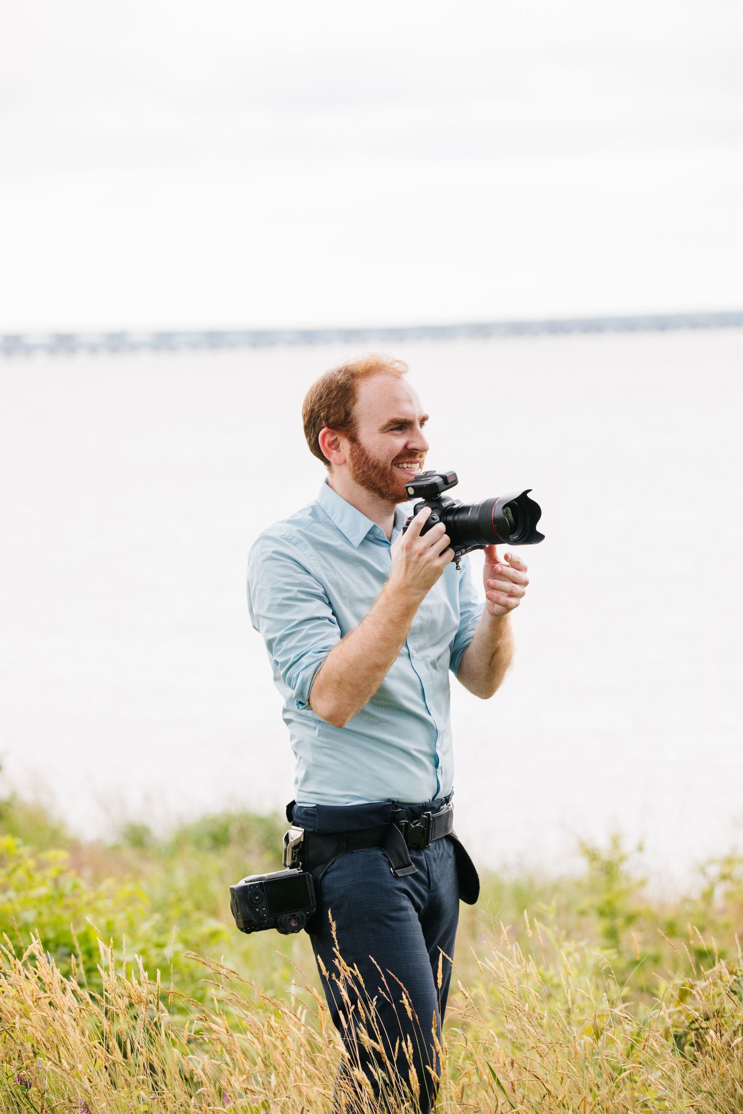 Zach Blum Photographer from Philadelphia, PA—aka Zach Blub—captured mid-action, camera in hand, creating timeless wedding moments.