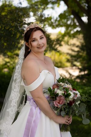 bridal portrait white dress lavender sash, cathedral length veil