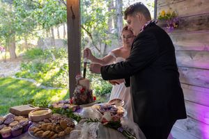 couple cutting cake