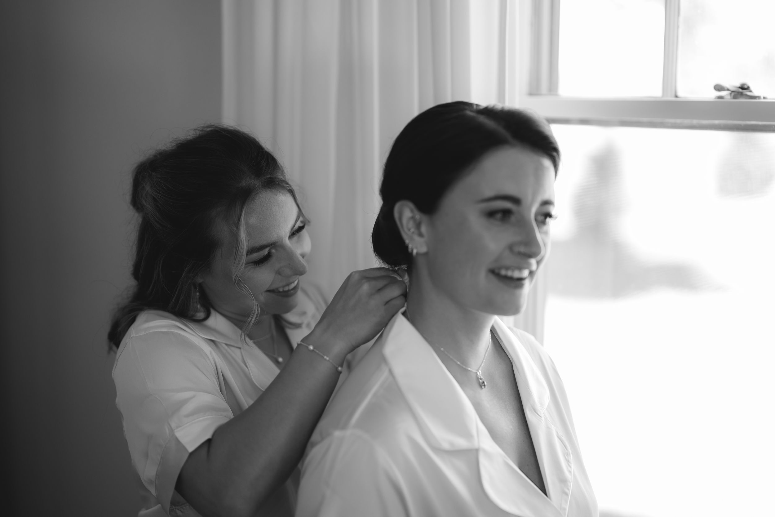 A black and white photo sequence shows varying emotional expressions of a couple in intimate poses.