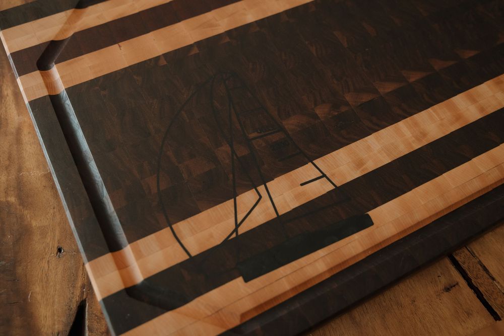 Close-up detail of wooden slats creating geometric shadows and patterns.