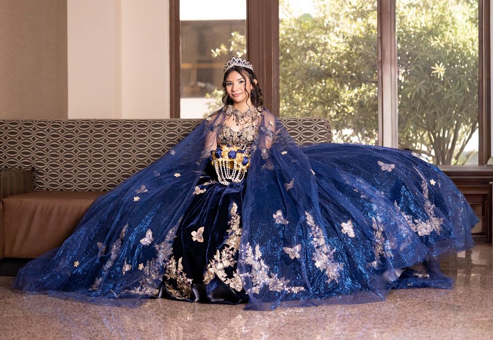 A royal blue quinceañera dress with metallic embellishments photographed in a sunlit room from different angles.