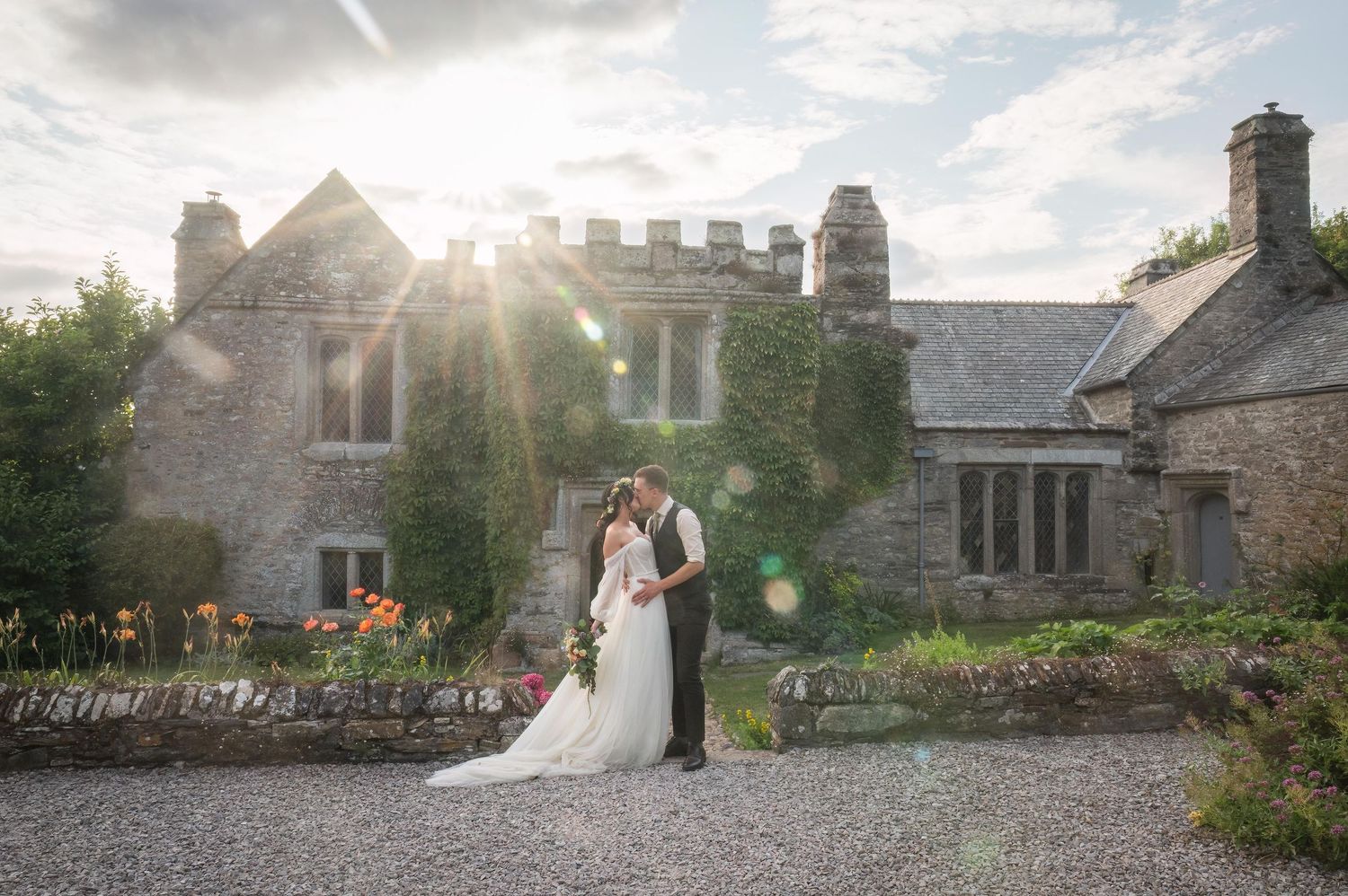 Wedding Photography Plymouth, Devon. Couple kissing at Hareston Manor, Plymouth.