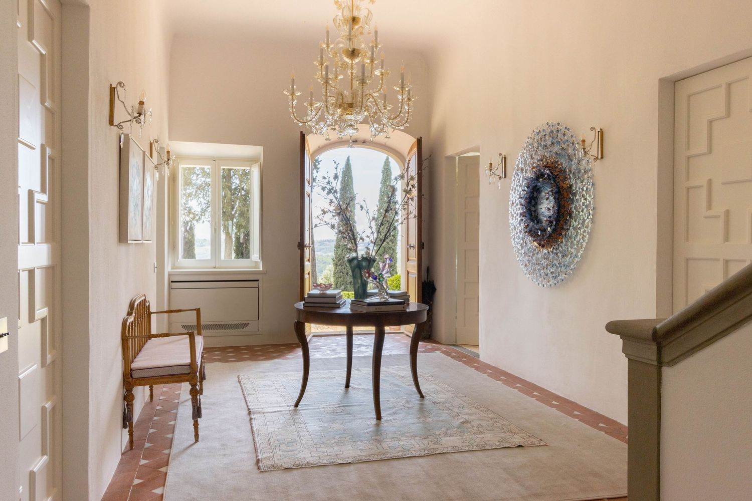 Luxury real estate photographer in Tuscany, Italy. A bright entrance with modern Tuscan vibe.