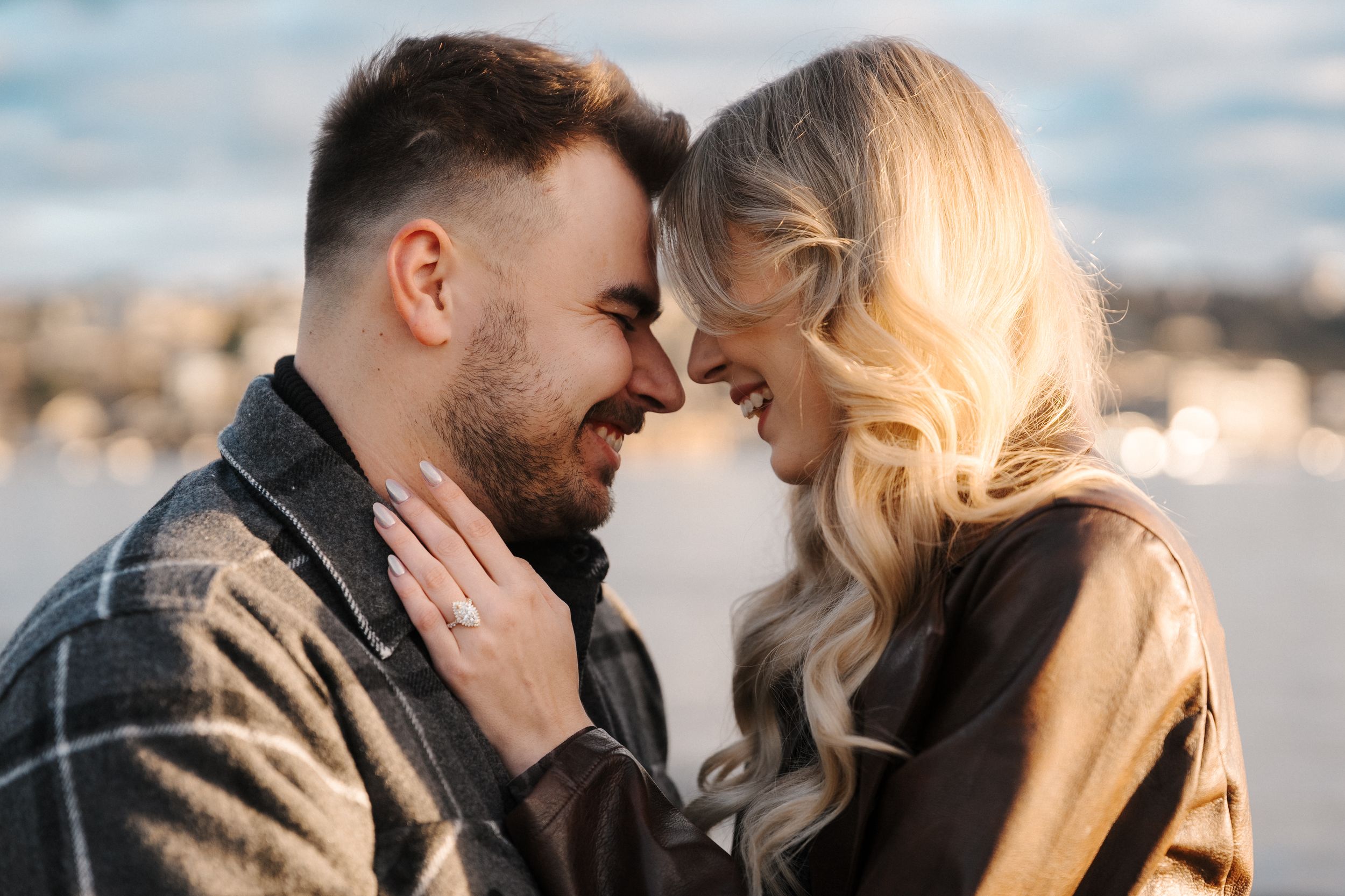 A romantic couple shares tender moments in a series of five intimate outdoor portraits at sunset.