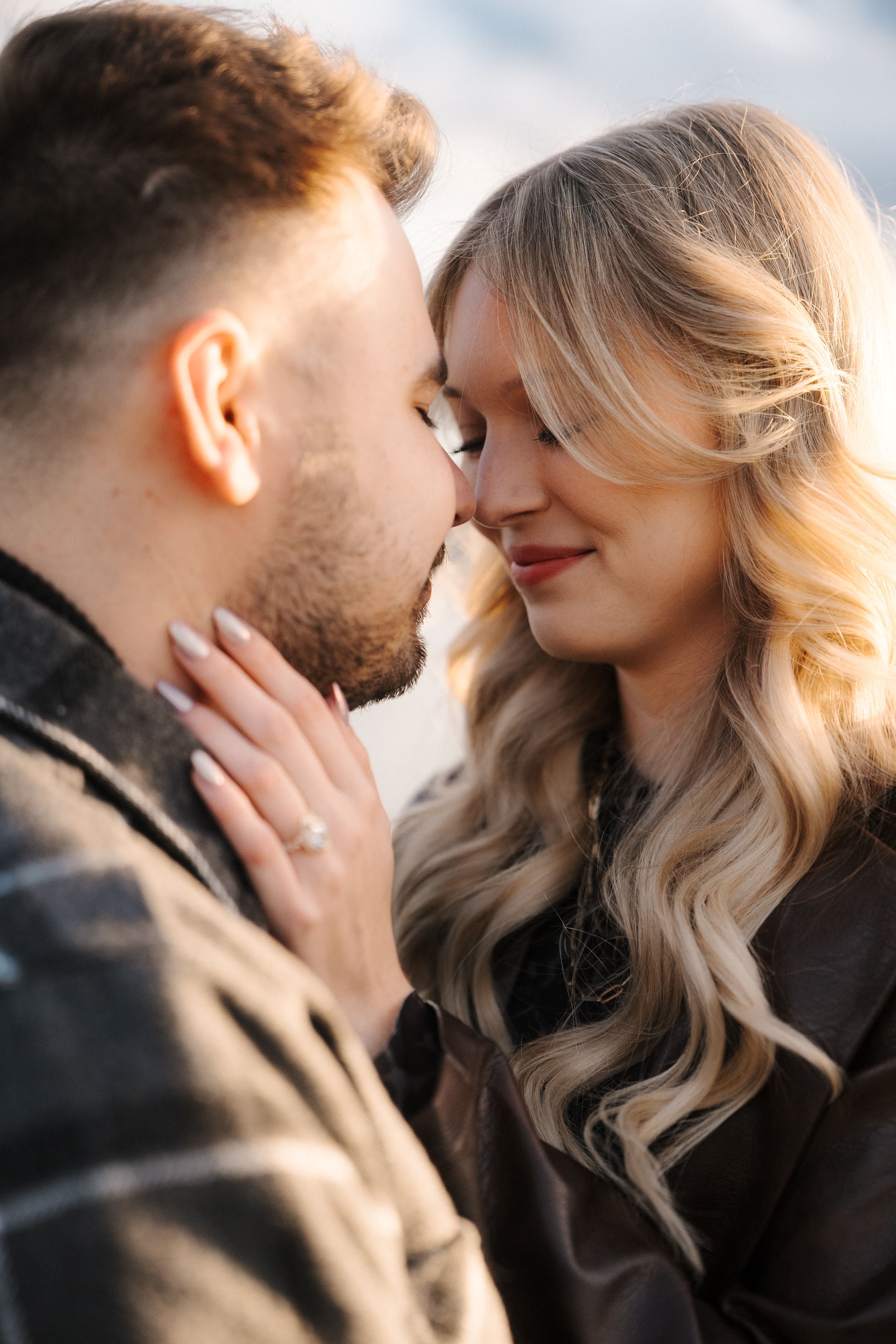 A romantic couple sharing intimate moments in a series of close-up shots showing tender affection and connection.