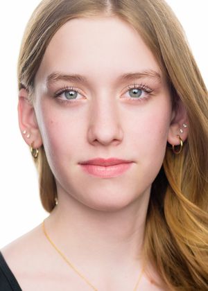 Portrait series showing different expressions against white background with soft lighting and natural makeup.