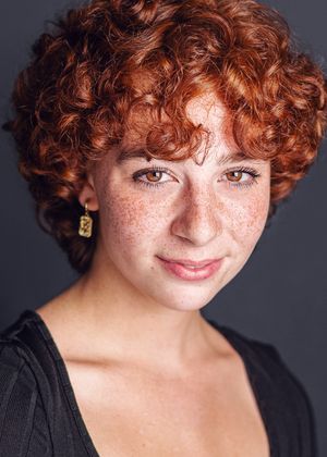 A series of headshots showing a person with vibrant curly red hair and freckles against a dark background.