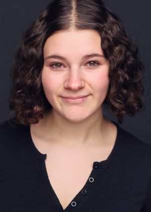 A sequence of headshots showing someone in black with curly dark hair against a dark background making various expressions.