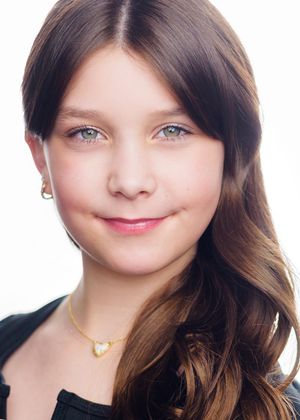 A series of similar headshots showing dark hair and a necklace against a light background.