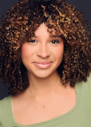 A series of headshots showing curly brown and blonde hair against a light background.