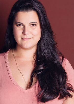 A series of headshots showing a person with long dark hair wearing a pink top against a reddish-brown background.