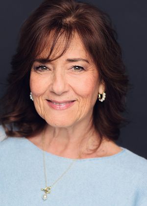 Portrait series showing expressions of joy and warmth against a light blue background.