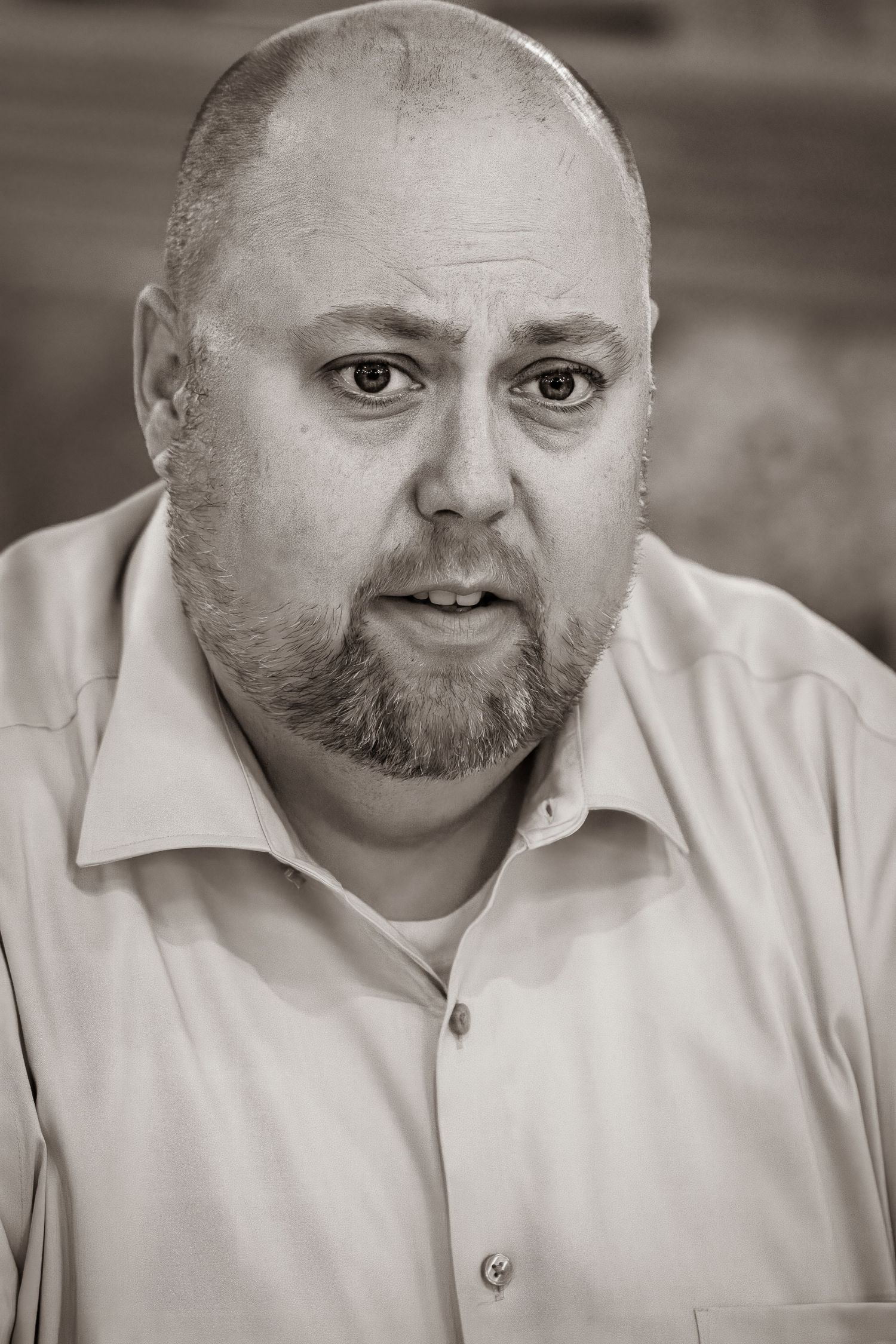 Frederick Maryland Wedding Photographer   A portrait series showing different expressions of a person in a white polo shirt.