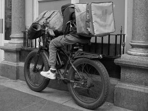 fine art photograph of bicycle food delivery rider Newcastle urban life