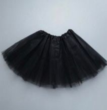 Black tulle tutu skirt photographed from multiple angles against light background.