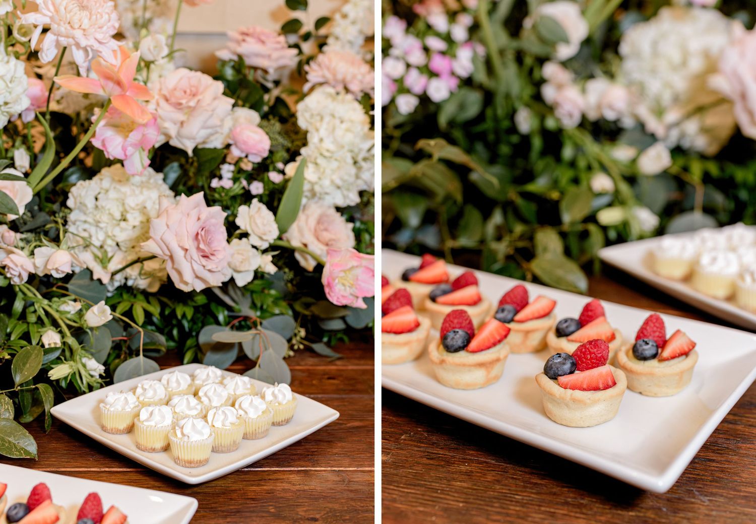 Elegant wedding dessert table with meringues and fruit tarts next to pink and white floral arrangements.