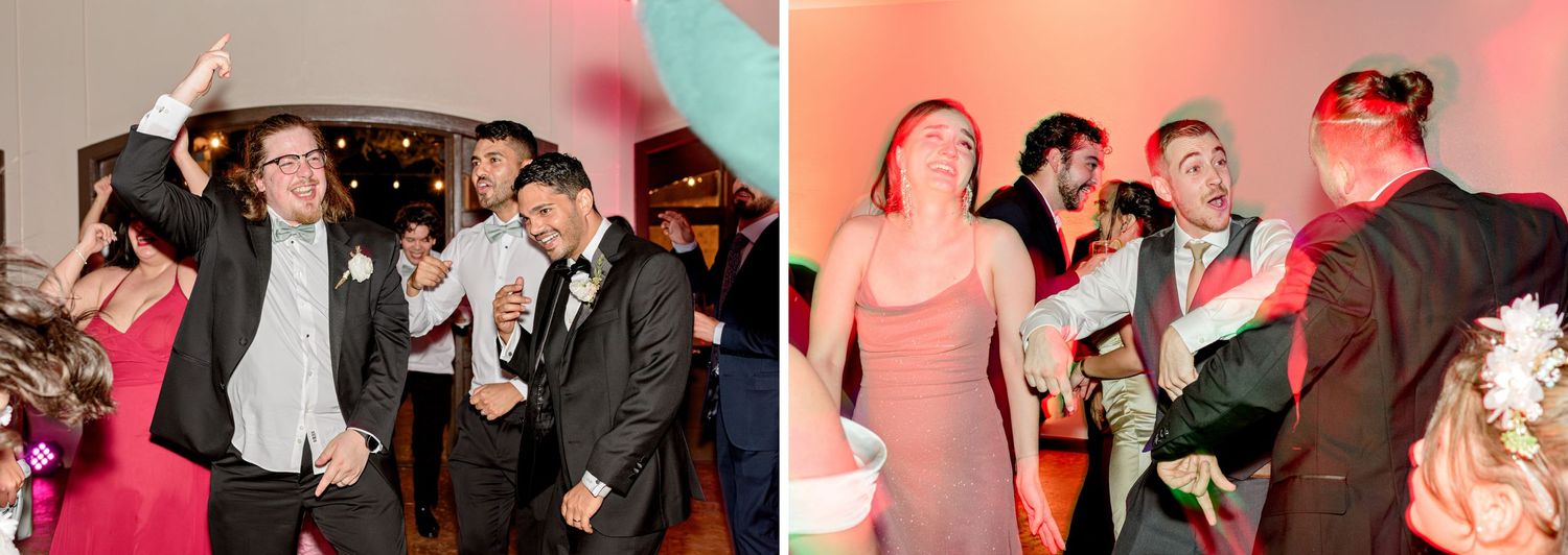 Wedding guests dancing together in a vibrant reception space with red and blue lighting effects.