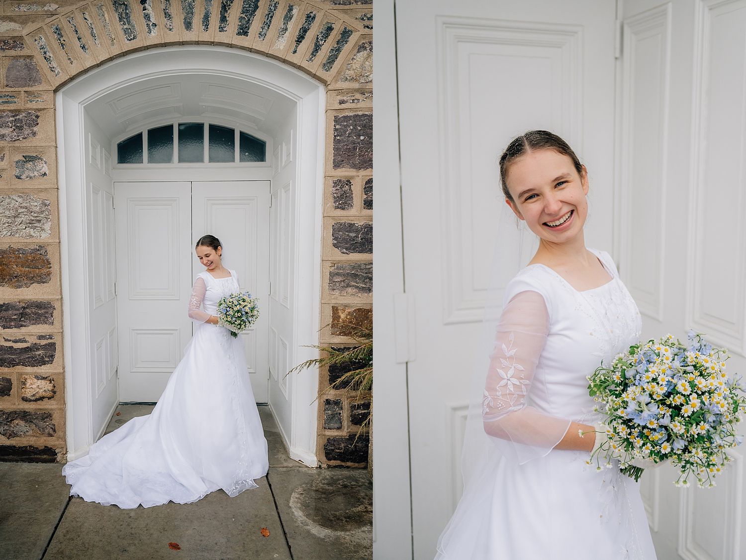 A bride in a long-sleeved white wedding gown holds a blue and white bouquet beside a classic arched doorway.