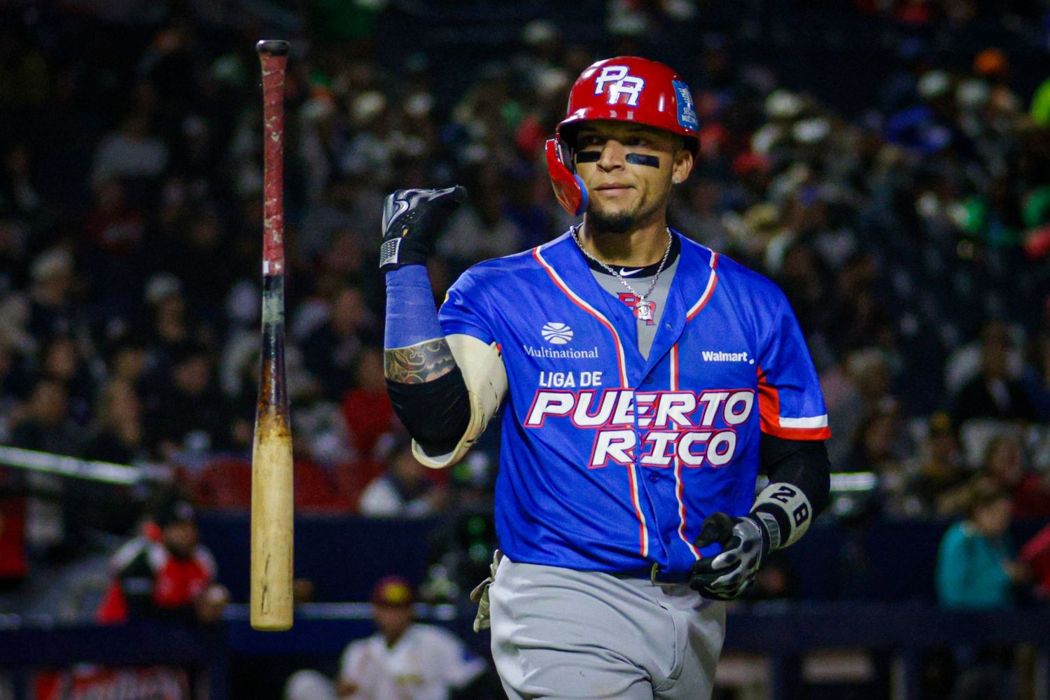 Isán Díaz celebrates with a bat flip after hitting a home run during the 2025 Caribbean Series in Mexicali.