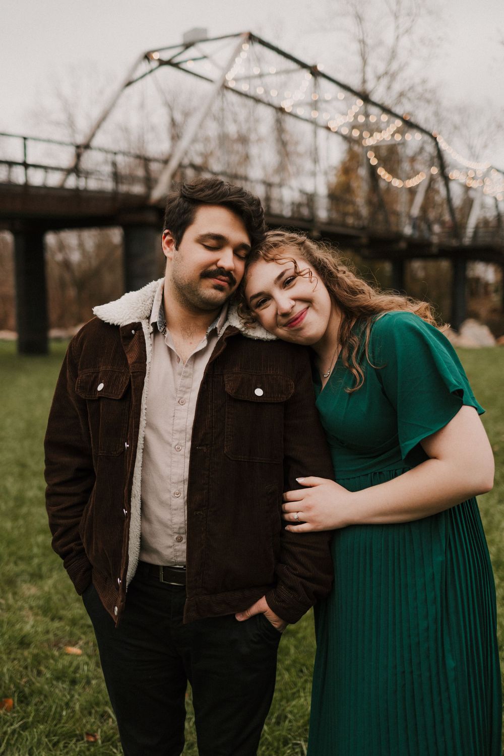 finley farms engagement session by the bridge rainy