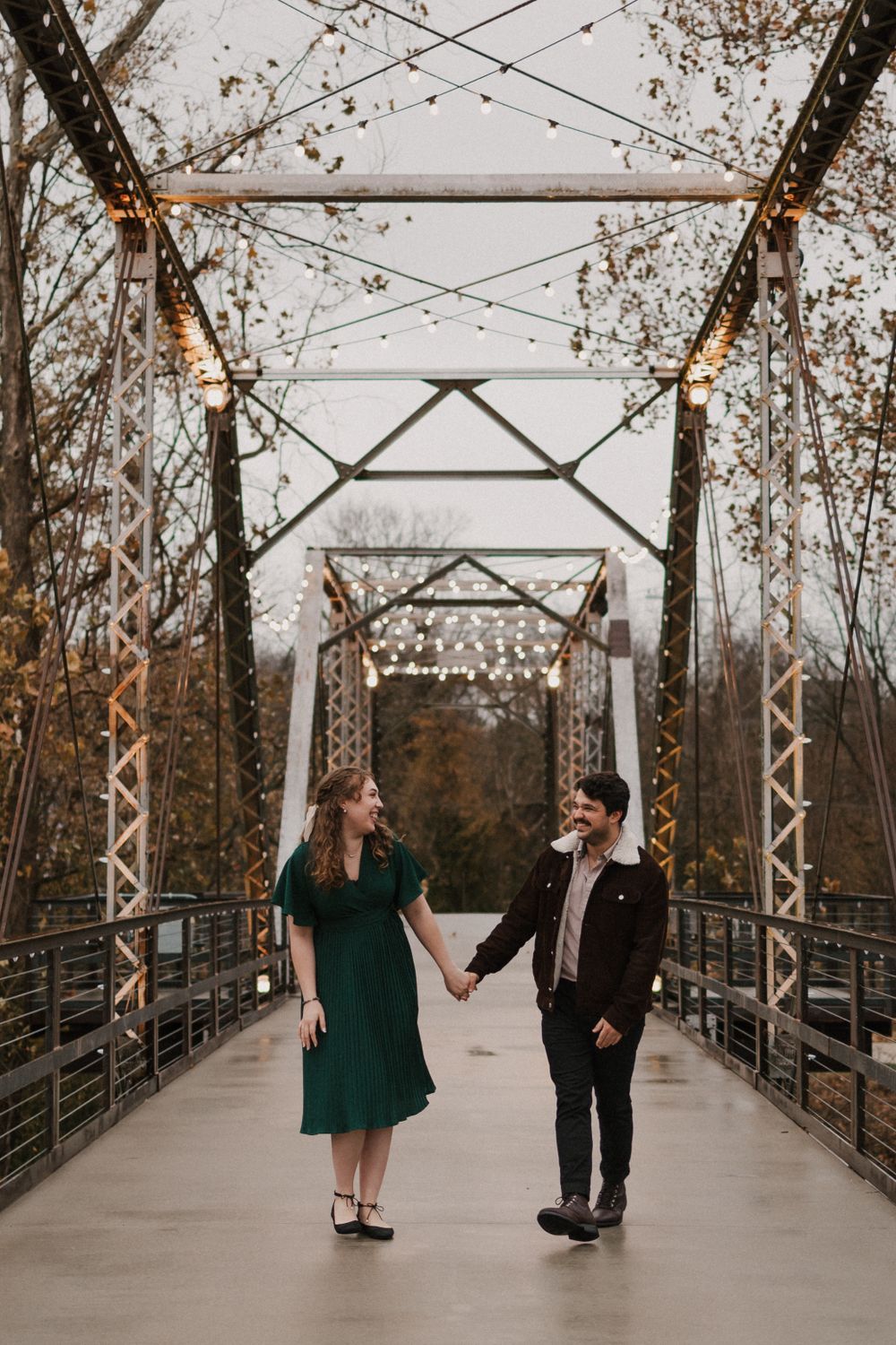 finley farms engagement session on the bridge ozark mo