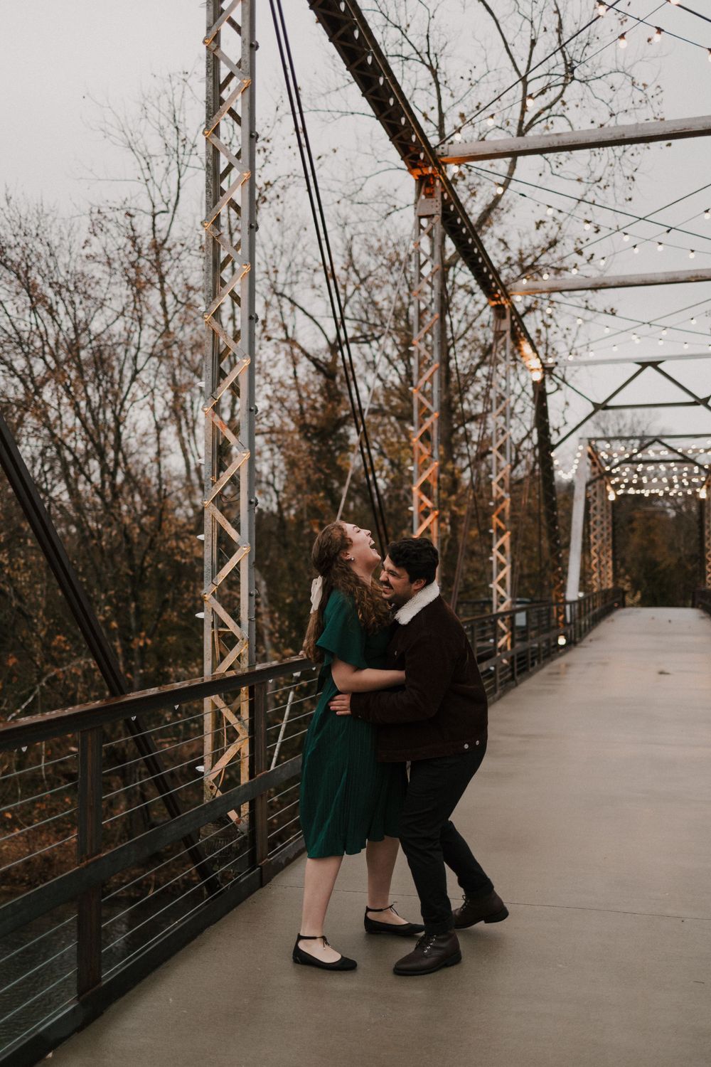 finley farms ozark mo engagement session on the bridge