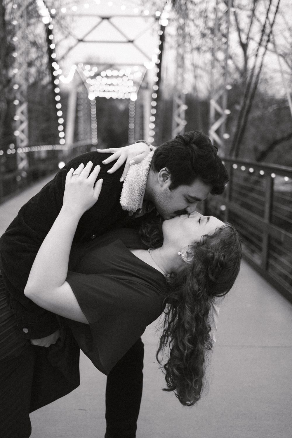 finley farms engagement session on the bridge dip kiss