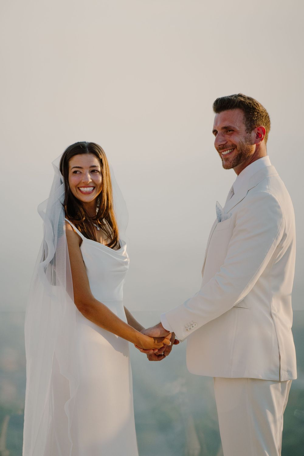 Bride and groom having their wedding ceremony in Taormina, Sicily