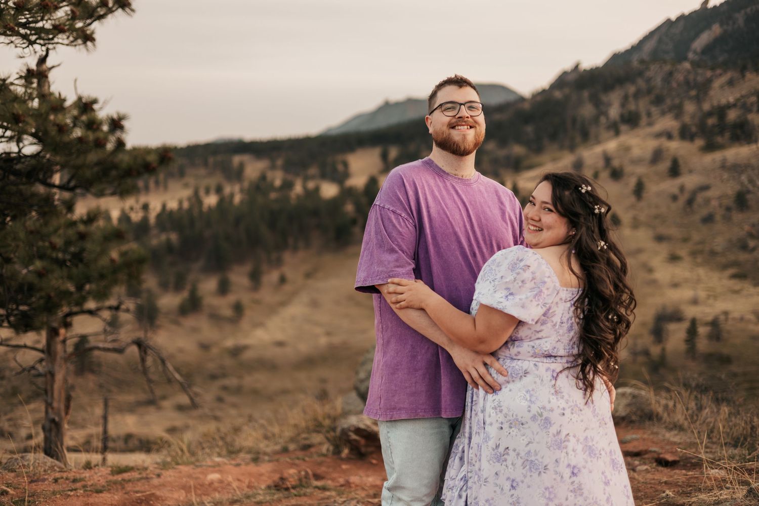 Couple embracing outdoors in Colorado mountains | Couple Photos in Boulder, Colorado