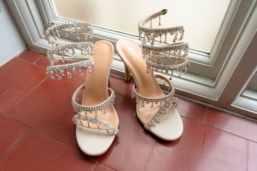 Indian Bride's Wedding shoes in window at St Audries Park Wedding venue