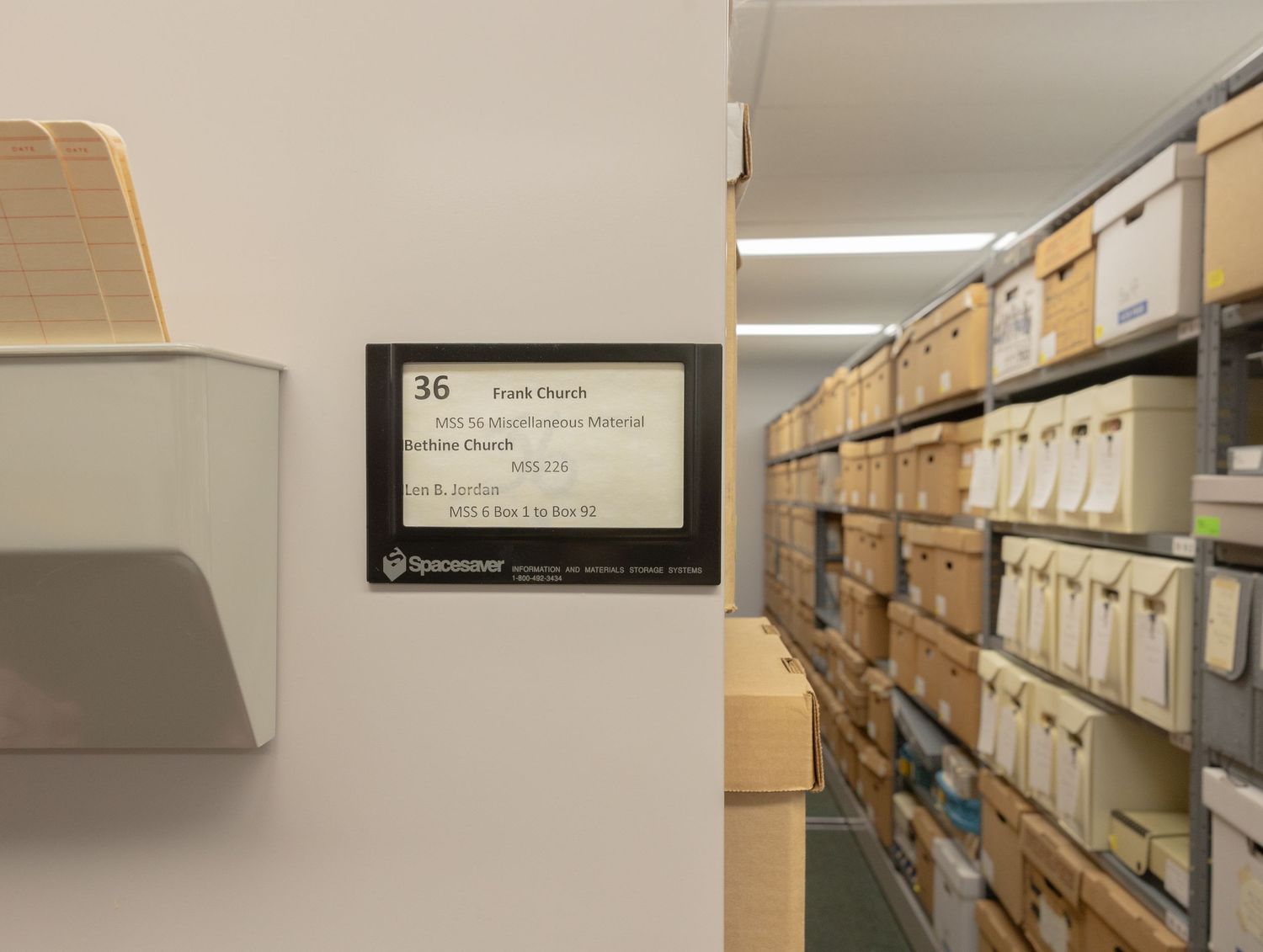 Archive storage unit label showing Frank Church collection number 36 on a wall of boxed records.