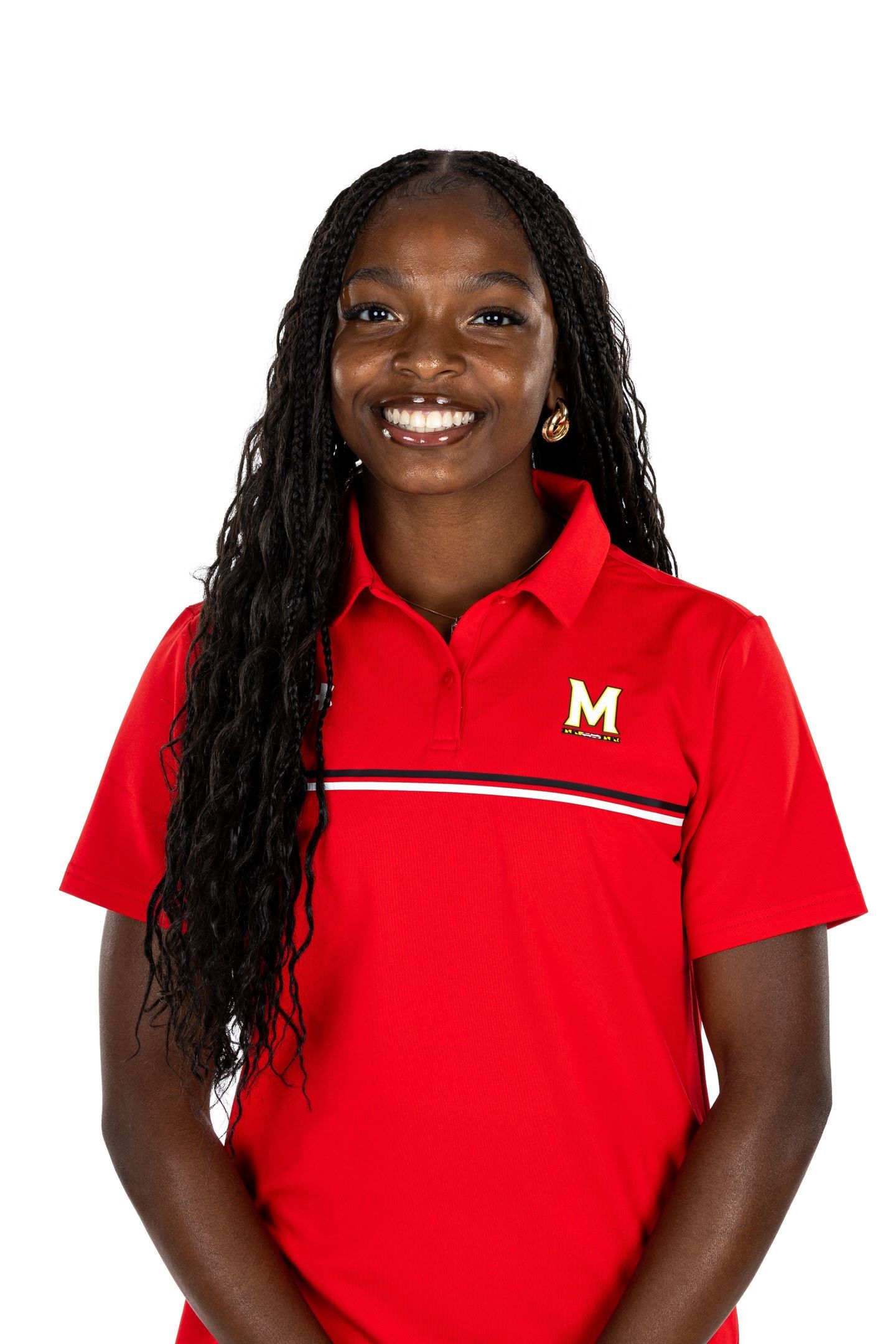 A smiling young woman in a red University of Maryland polo shirt poses for an official athletic headshot.