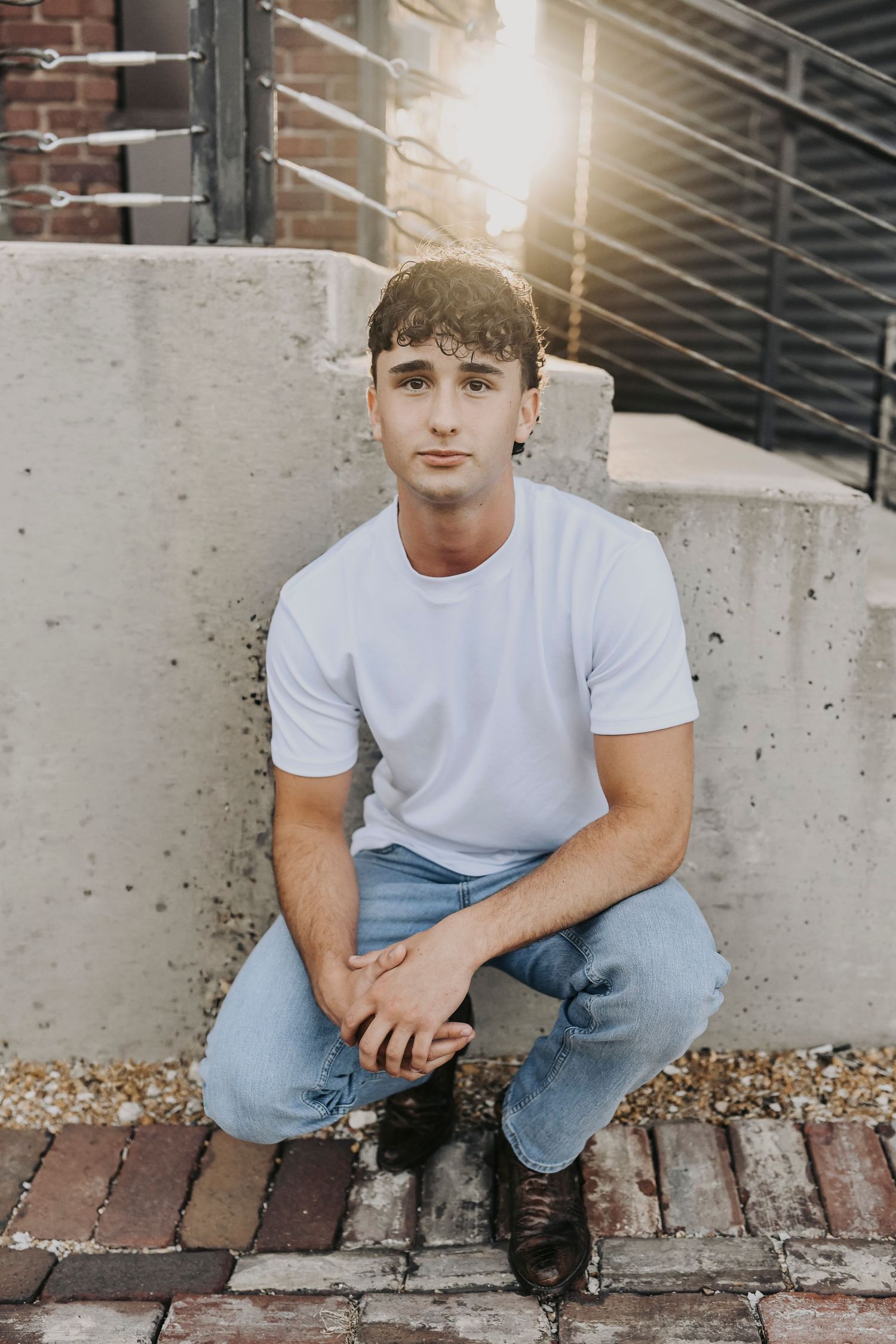 Editorial senior portraits for boys in McKinney Texas with industrial textures and denim styling