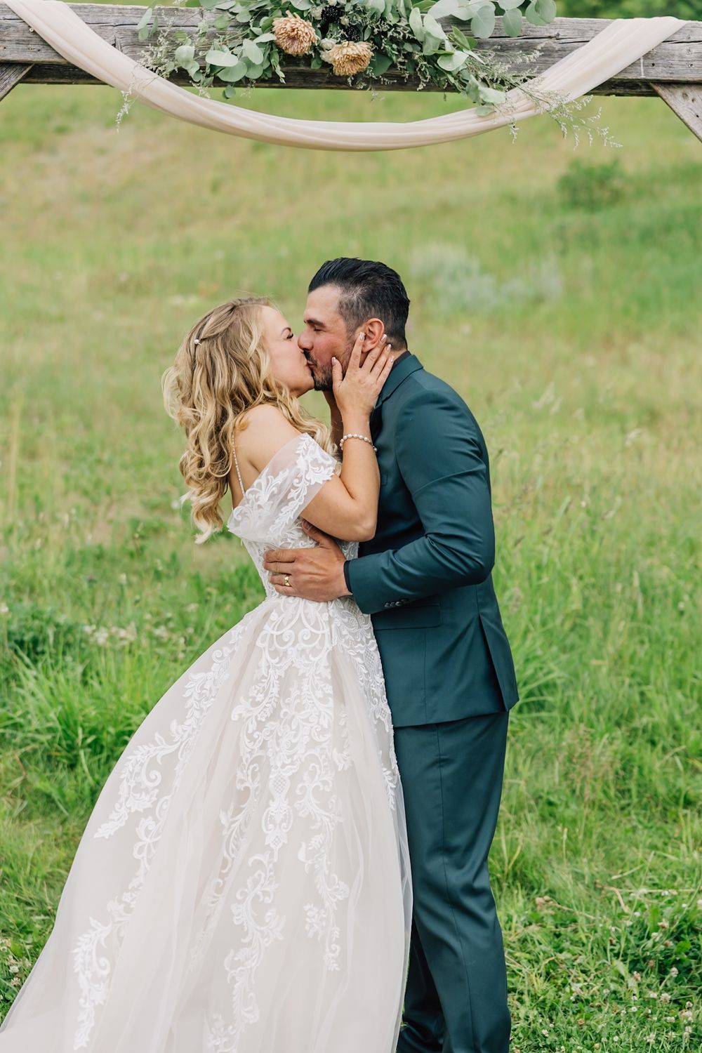 Bride and groom first kiss as husband and wife