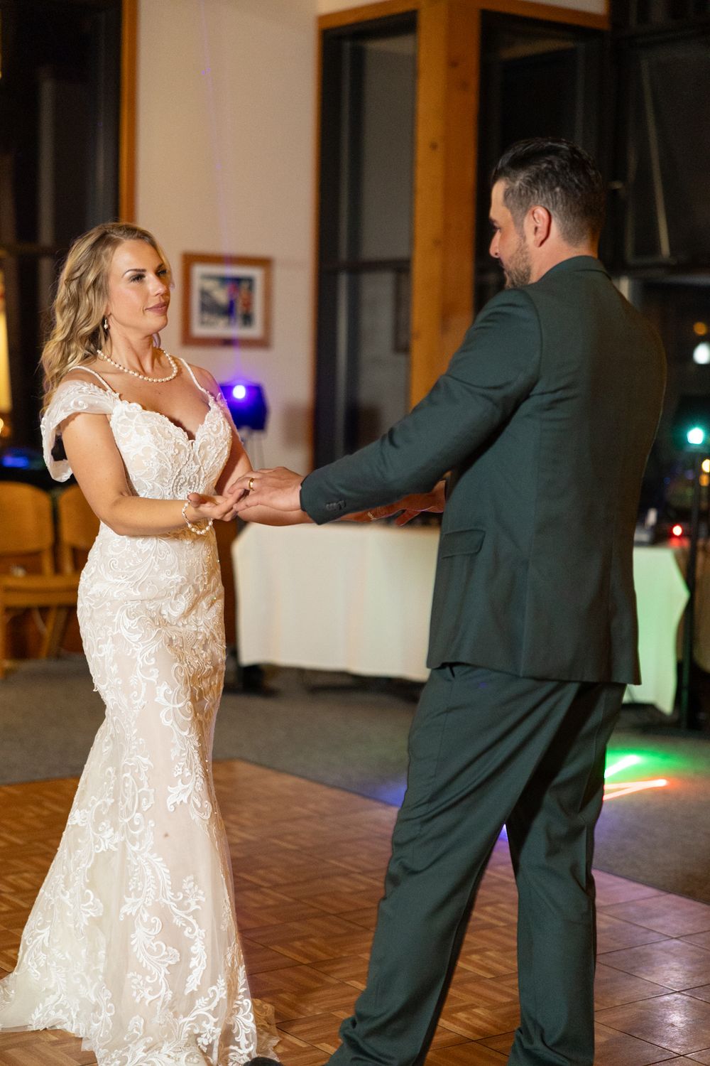 Bride and Groom dancing at the Deer Park Chalet dance floor at night