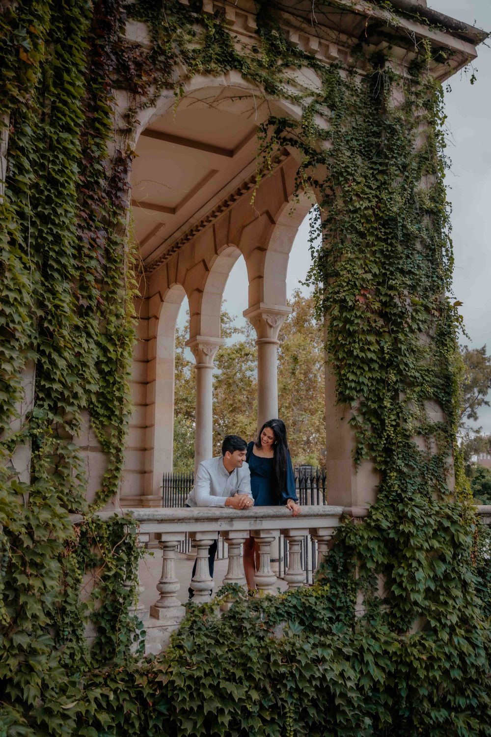 Candid Barcelona photographer capturing playful moments in the park.