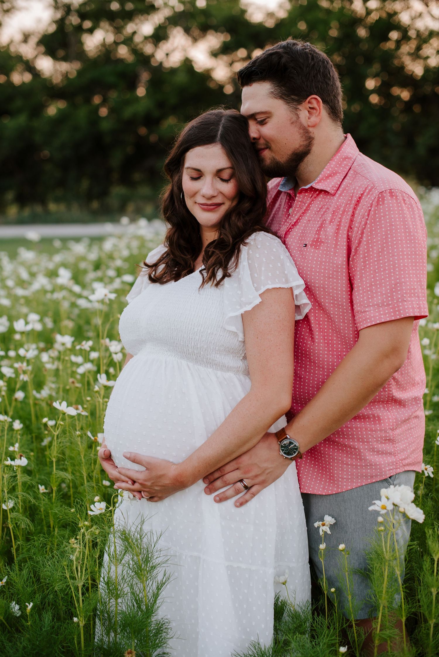 Flower field maternity session in Wichita Kansas by Jessica Nadine Photography