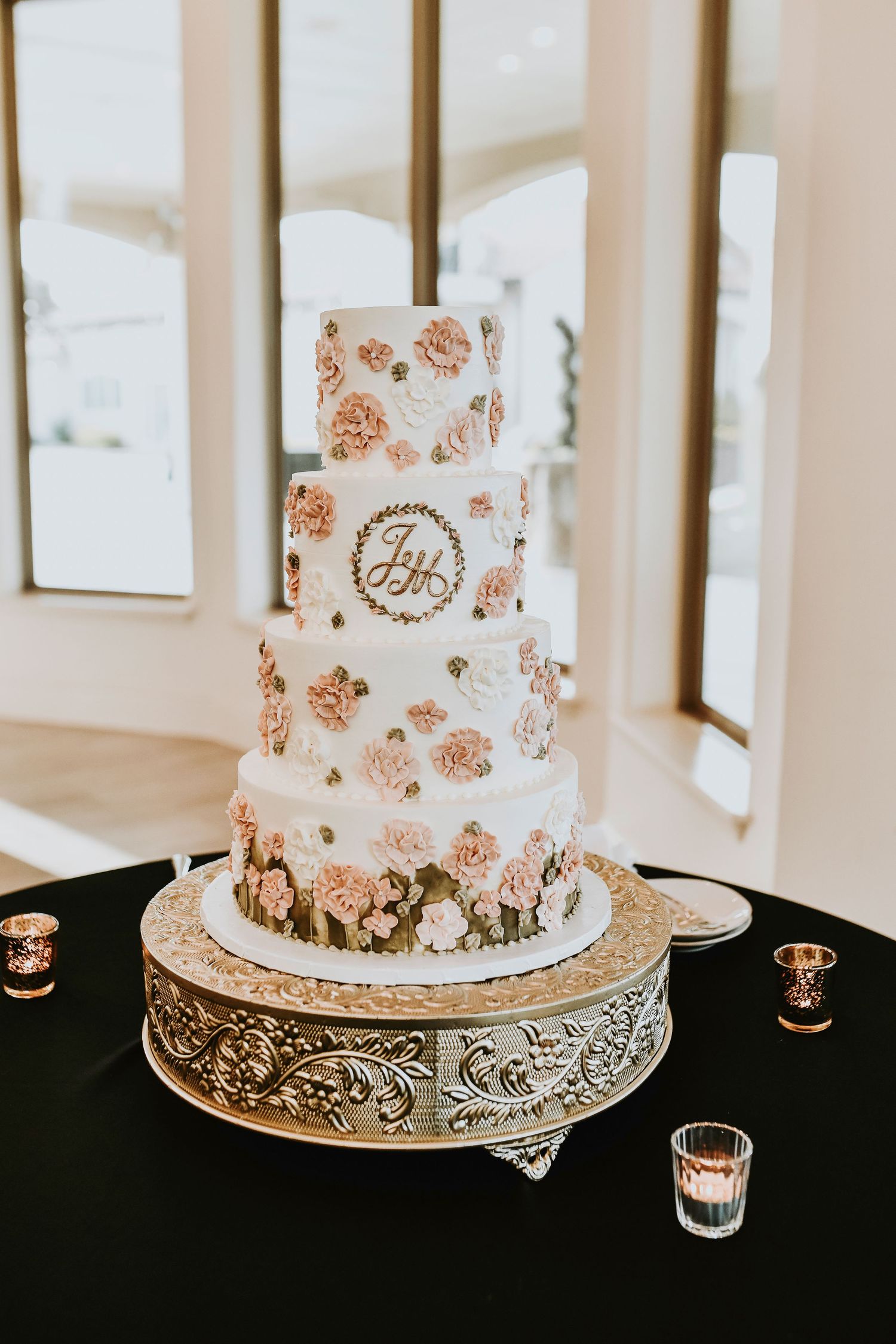 Bride and groom cutting their wedding cake at D’Vine Grace Vineyard