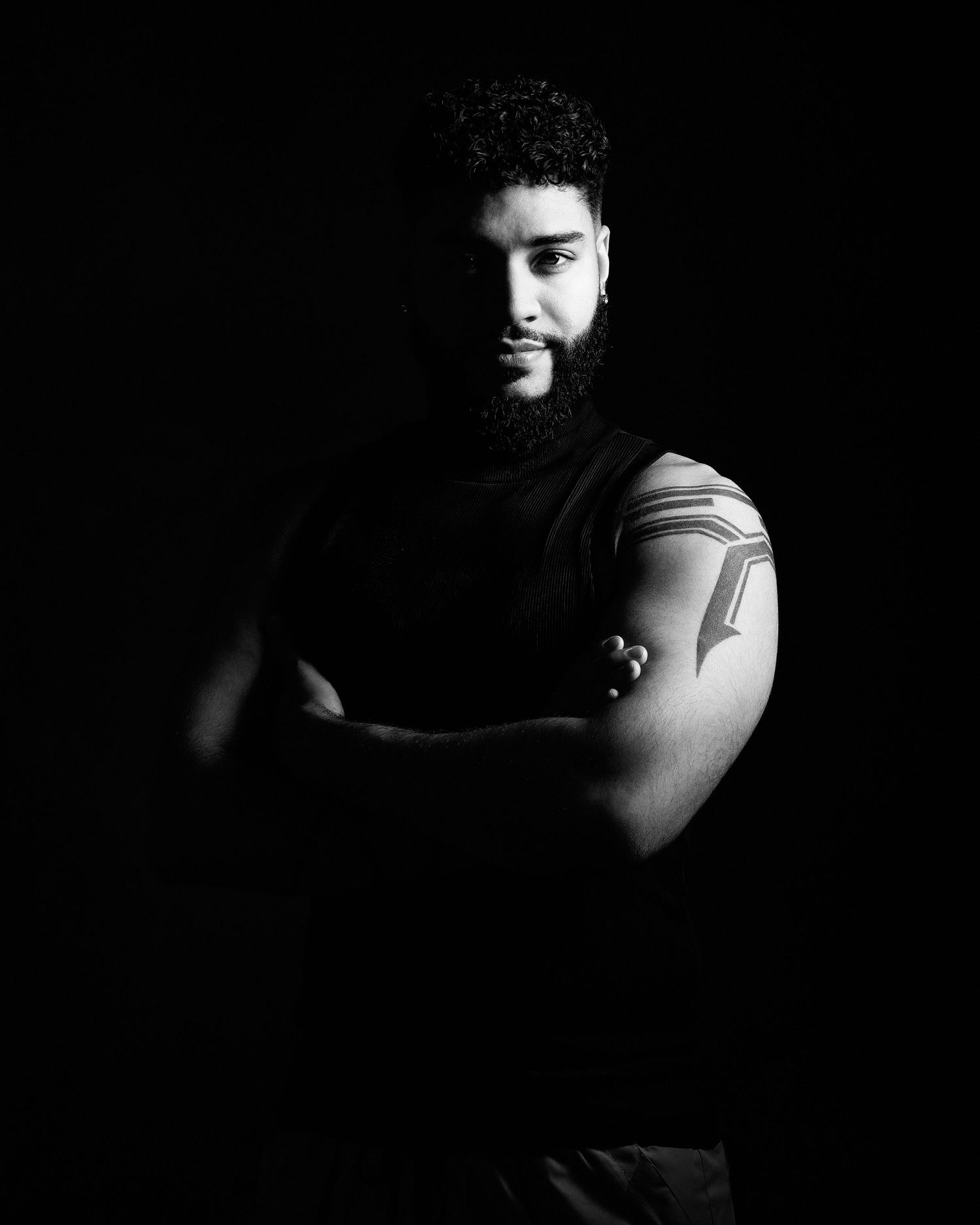 David G Holt Photography - Artistic black and white portrait with dramatic side lighting.