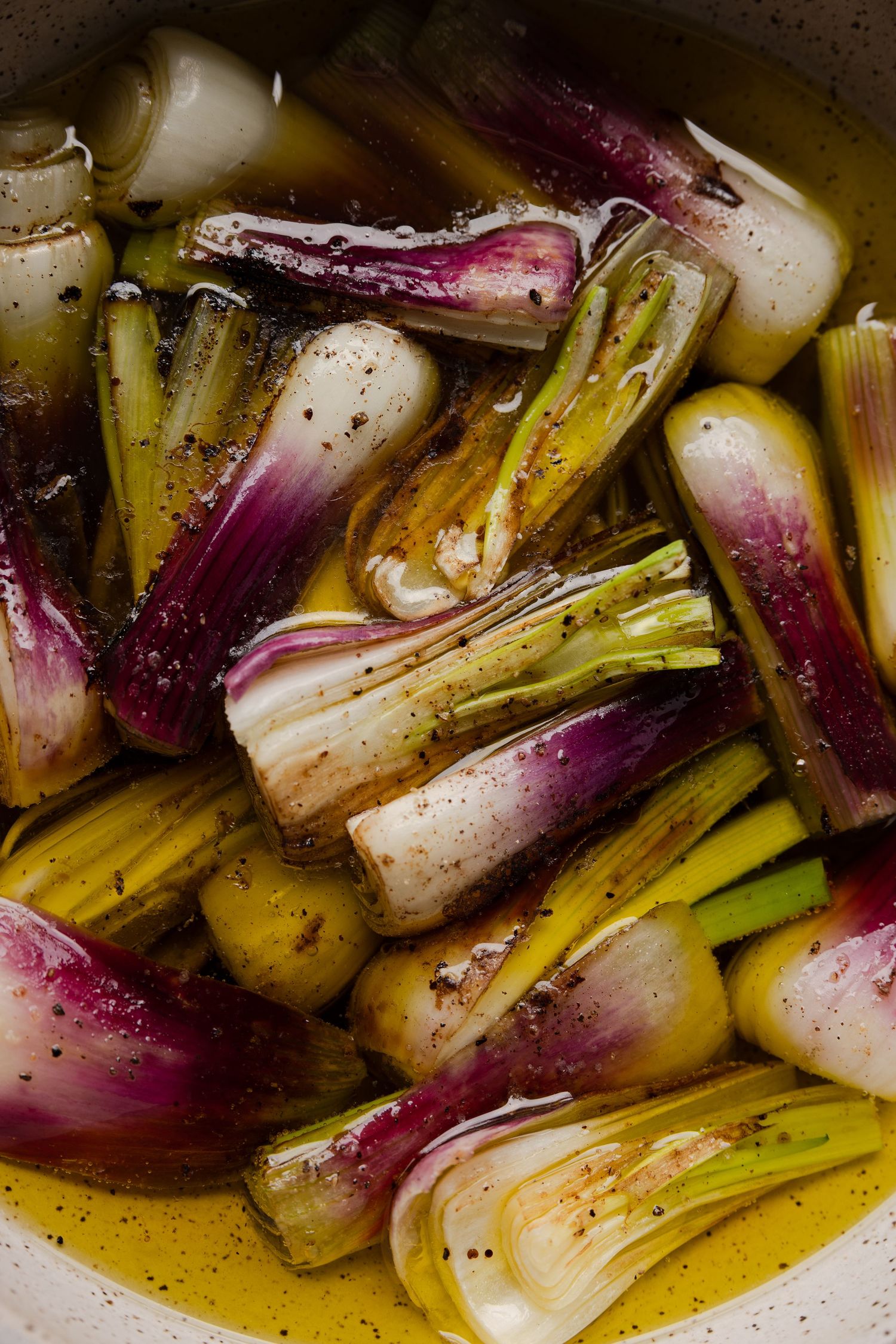 Purple spring onion in oil, spring onion confit