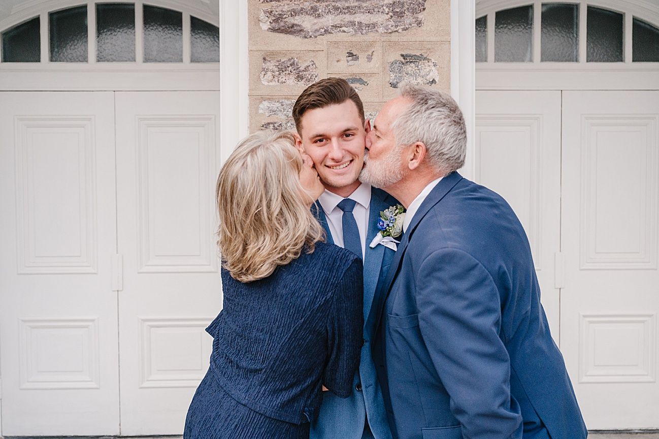 A romantic series of photos showing a couple sharing sweet moments in front of a white garage door.