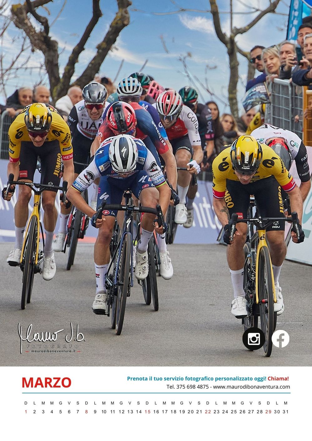 Professional cyclists racing in a tight pack during a competitive road cycling event.