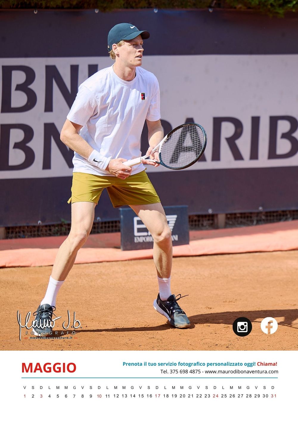 Tennis player in white shirt and yellow shorts demonstrates athletic stance on clay court during match preparation.