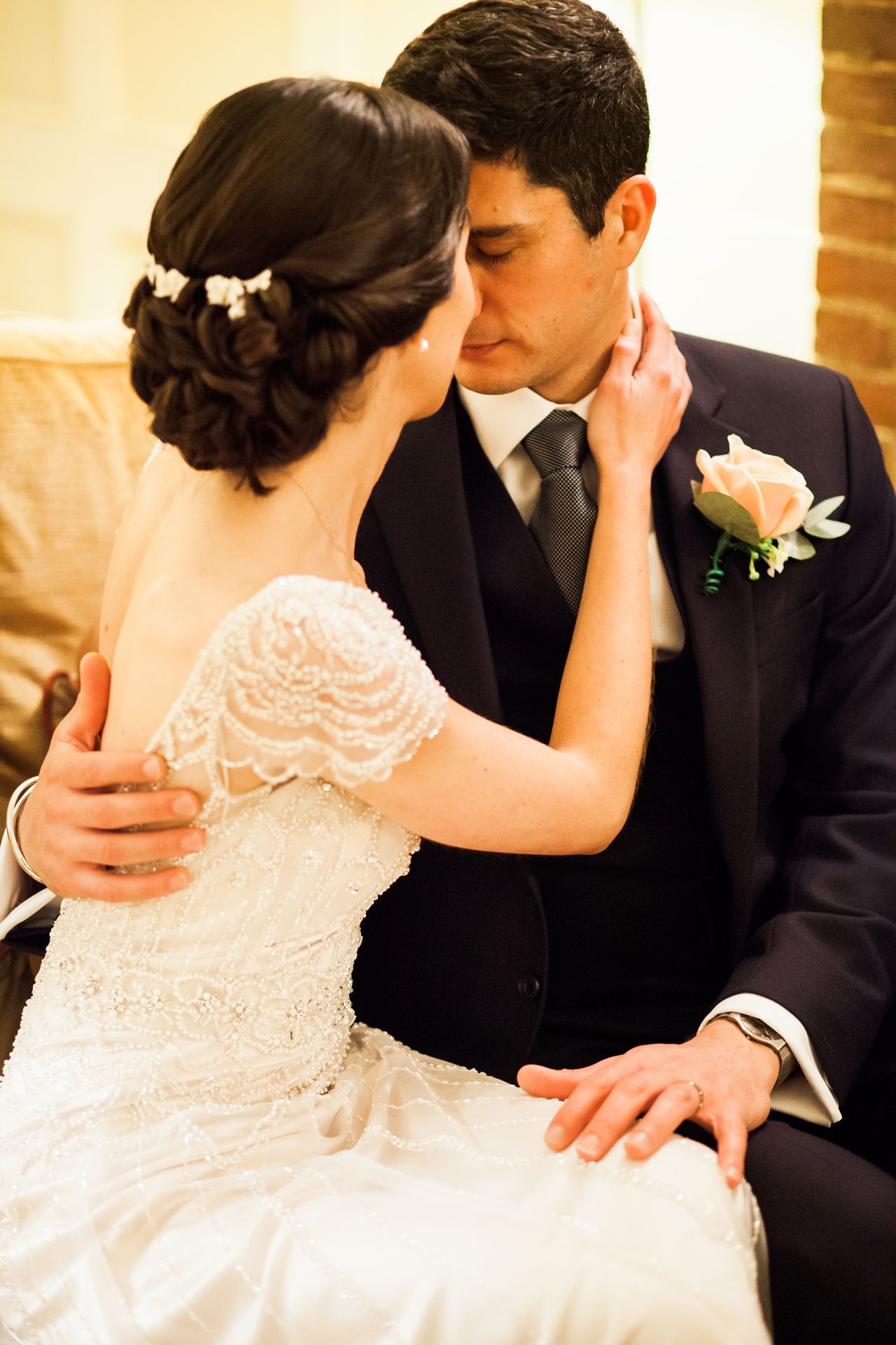 A romantic sequence of wedding photos showing tender moments between newlyweds in elegant attire.