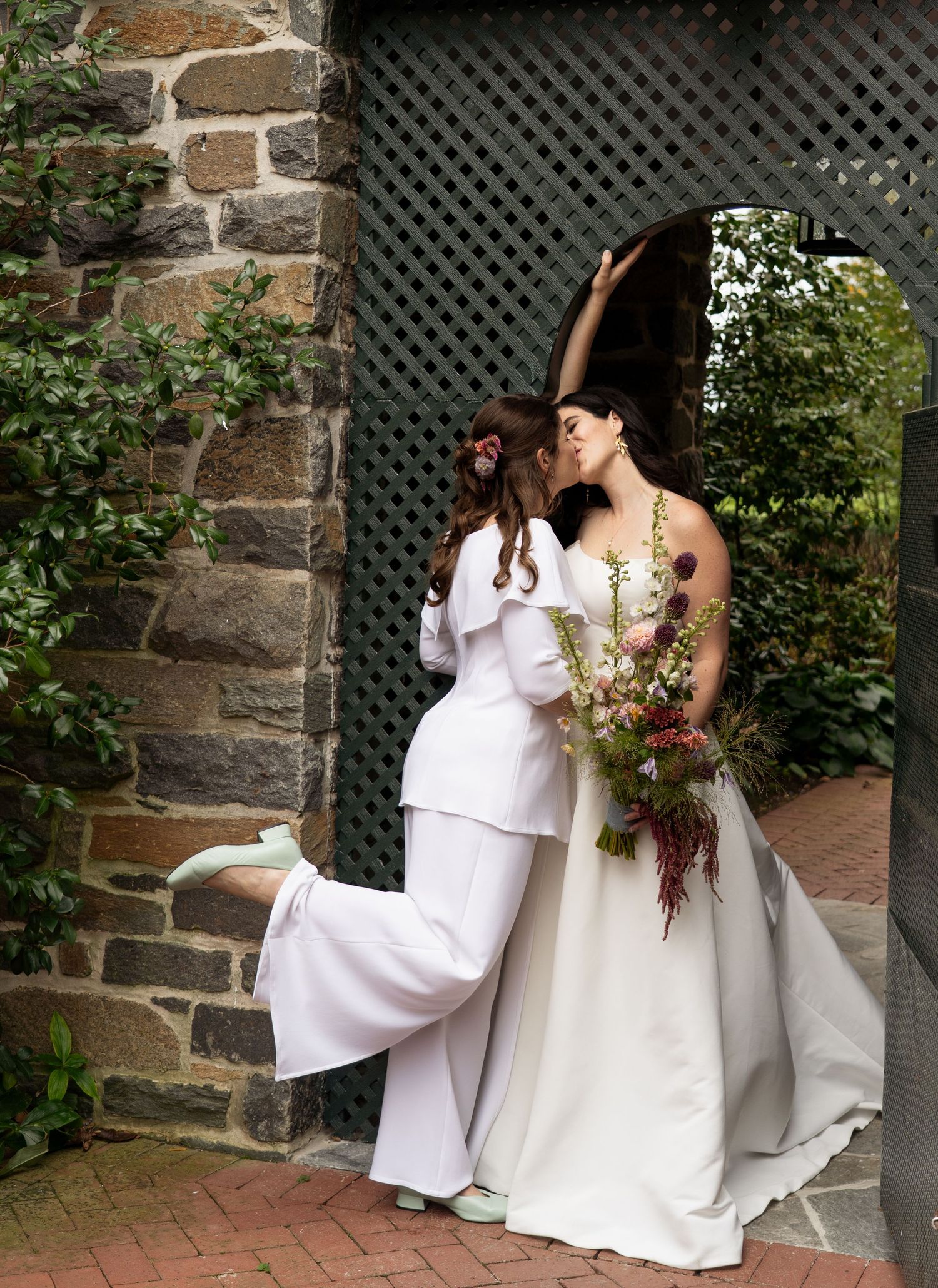 Wedding couple framed by a passageway
