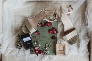 Flat lay of brides details at Henham Barns