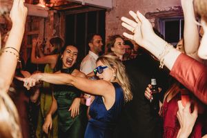 Laughter amongst friends at Henham Park Wedding
