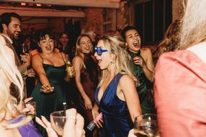 laughter and dancing during reception at Henham Barns