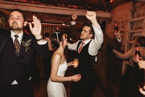 Bride and groom candid dancing durinbg reception at Henham Barns